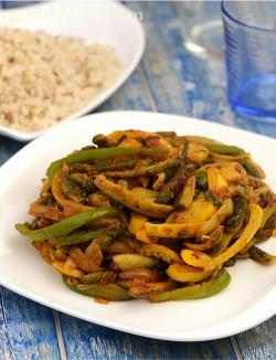 Karela and Capsicum Subzi,  an innovative combination of bitter gourd, onions and colourful capsicums are sautéed with a traditional tempering, resulting in a flavourful and aromatic subzi that goes well with rice and rotis.