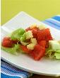 Tomato Cucumber and Lettuce Salad in A Lemon Dressing