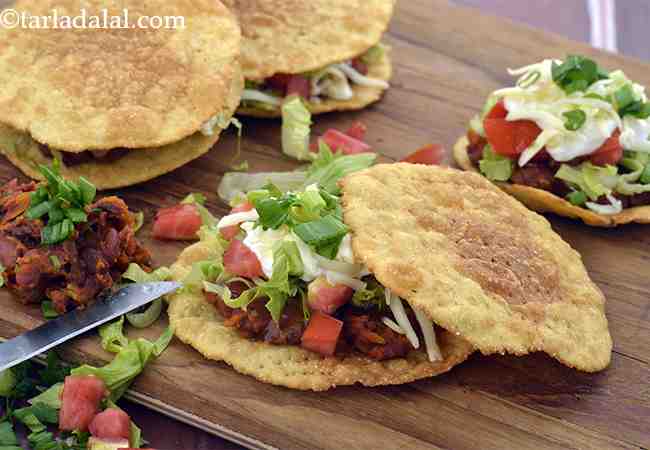 Tostadas Stuffed with Refried Beans and Sour Cream